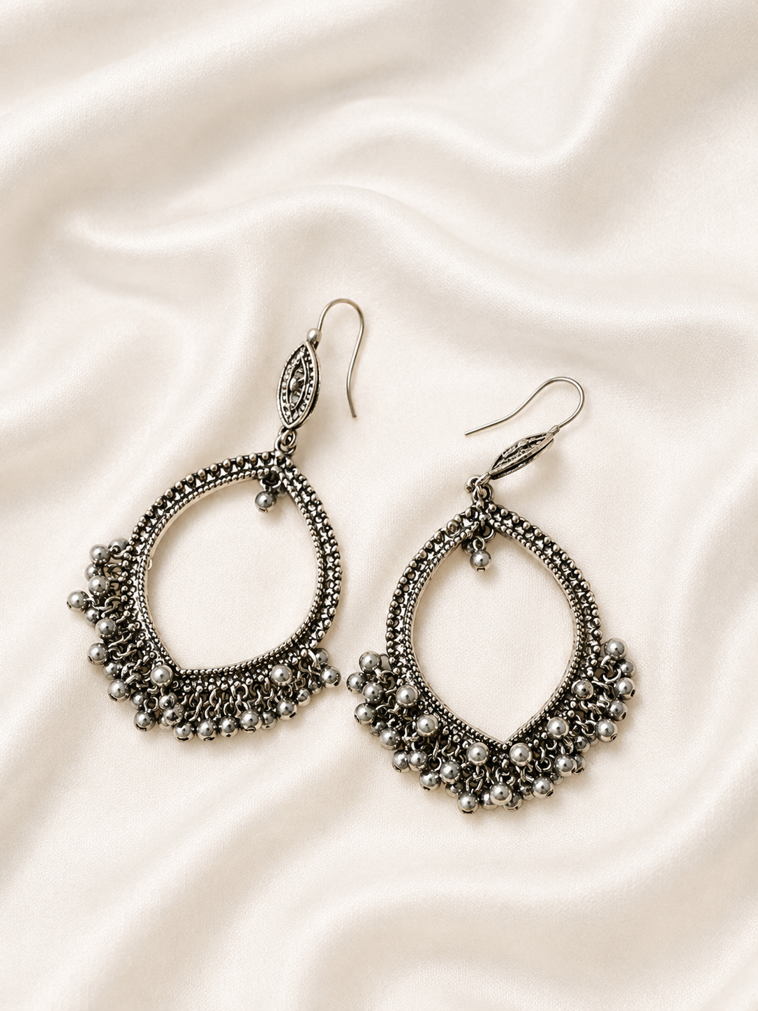silver-toned oxidized jhumka