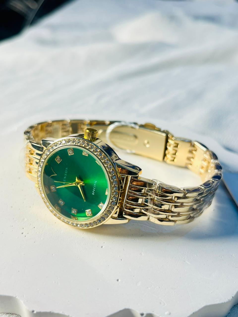 Quartz Gold Watch With A Green Dial Watch