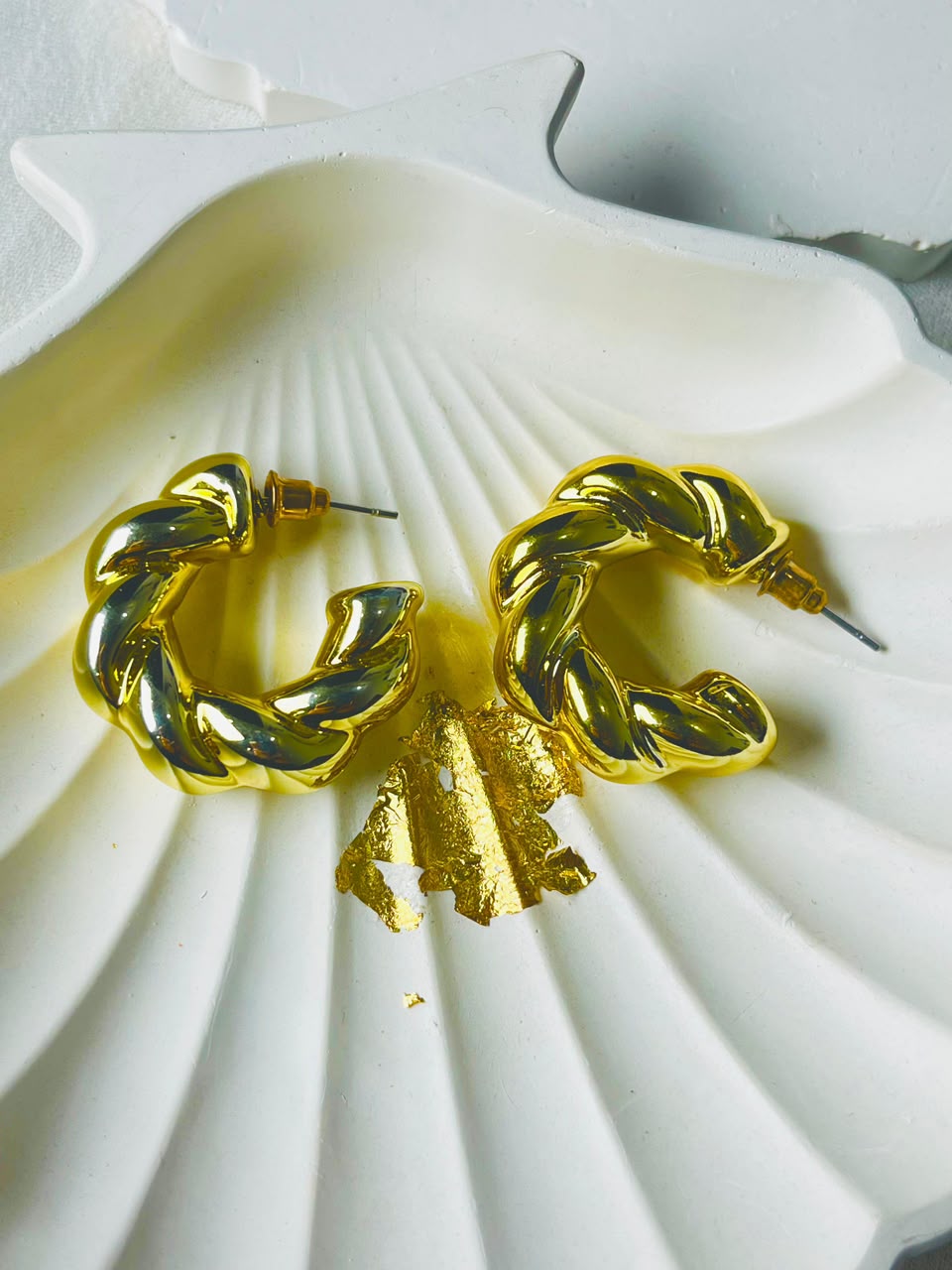 Golden rounded hoops