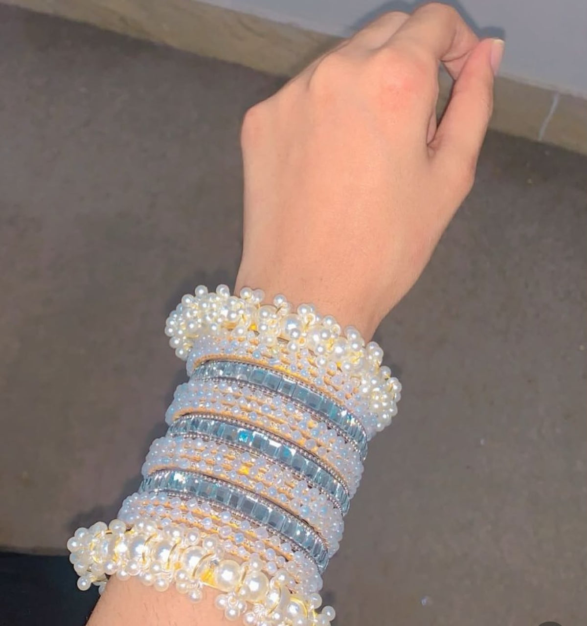 Metal pearl bangles set